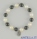 Bracciale elastico ematite e perla bianca
