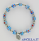 Bracciale elastico imitazione murrina azzurro e medaglia miracolosa