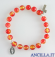 Bracciale elastico perle vetro bicolore rosso/giallo e medaglia miracolosa