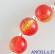 Bracciale elastico perle vetro bicolore rosso/giallo e medaglia miracolosa