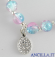 Bracciale elastico perle vetro bicolore turchese/rosa