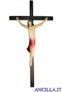 Corpo di Cristo stilizzato (rosso) su croce diritta moderna scura