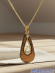 Collana con pendente in legno e cristalli Swarovski