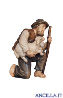 Pastore inginocchiato con agnello in braccio Rainell serie 15 cm