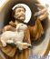 San Francesco con agnello e colomba mezzobusto